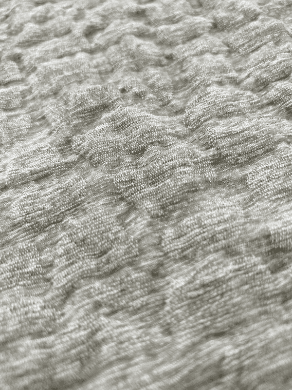 Filtserie av oregelbunden lerprickig chenille hemtextiltyger